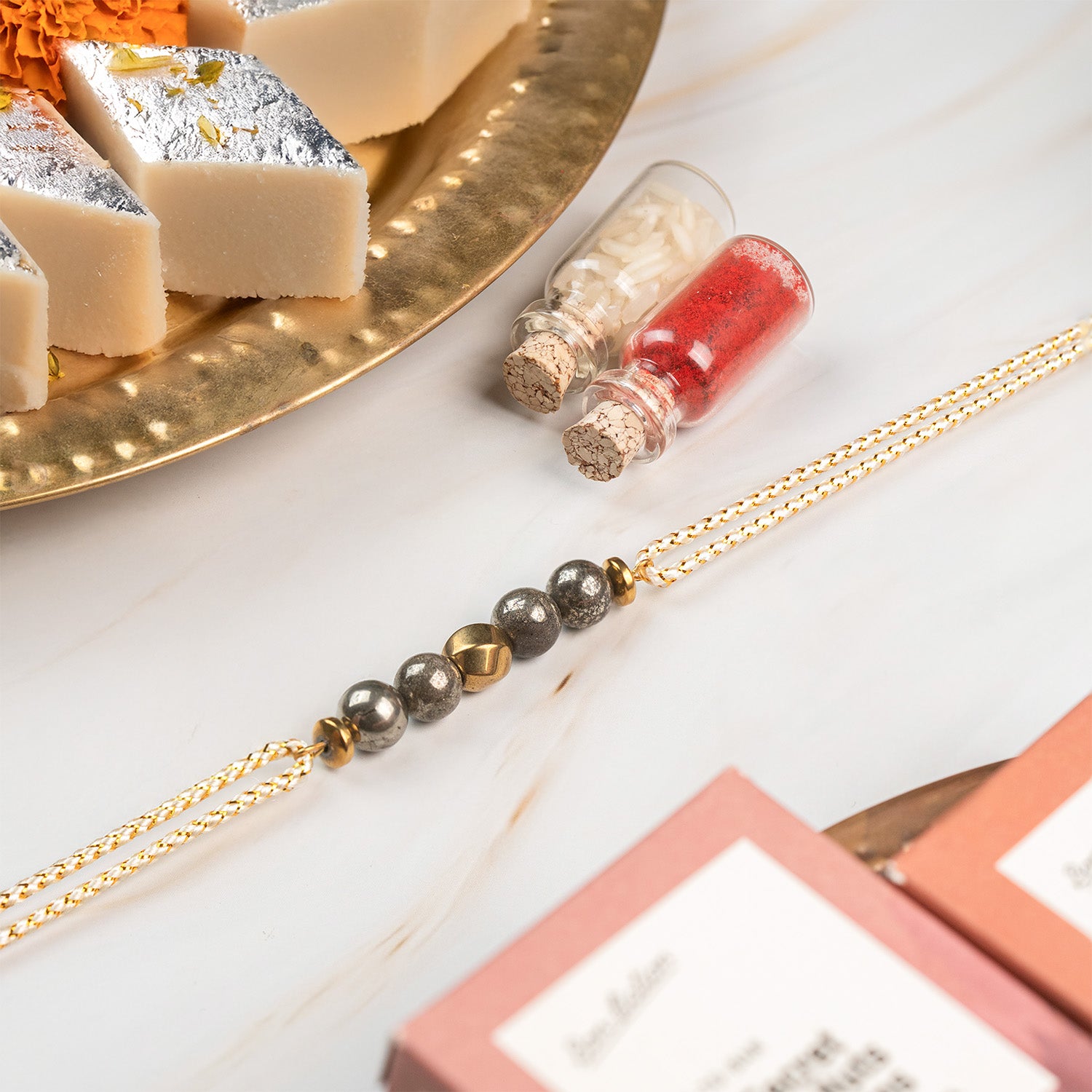 Rakhi Hampers under ₹1500  Pyrite